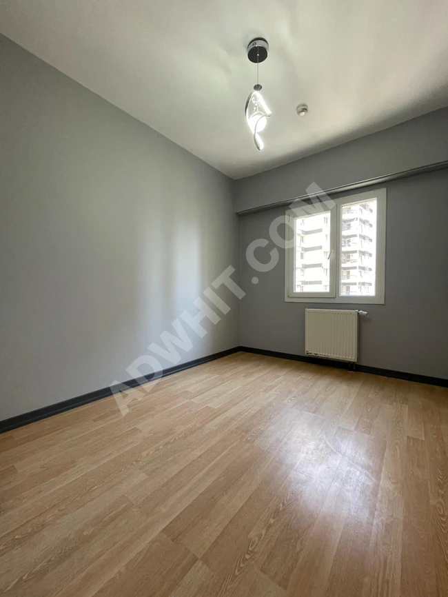 An apartment with a garden view in a complex near the metro for urgent sale in Istanbul.