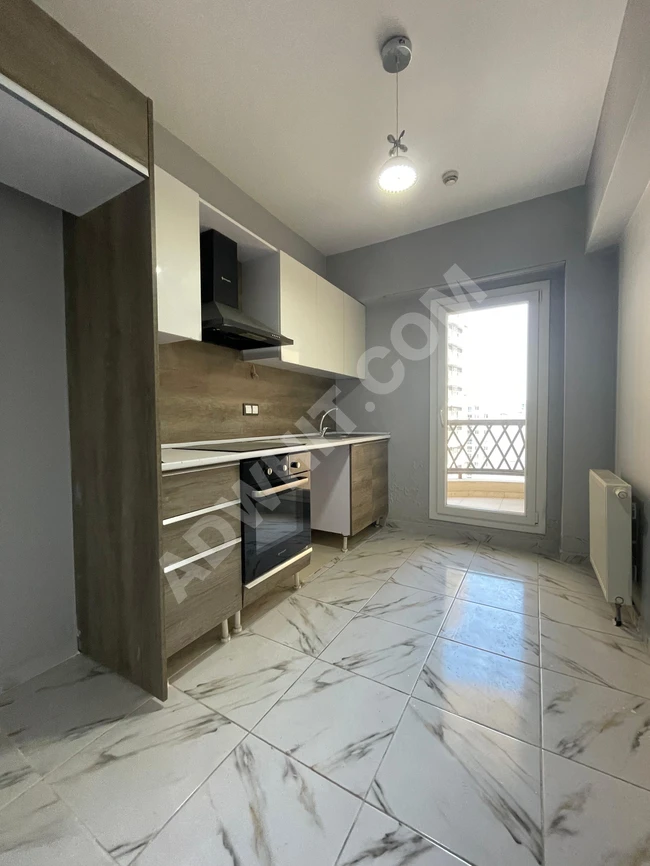 An apartment with a garden view in a complex near the metro for urgent sale in Istanbul.
