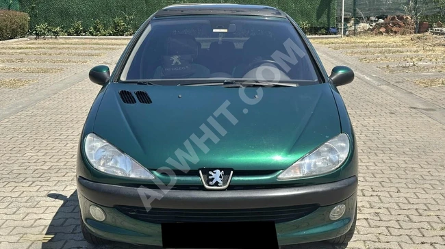 سيارة PEUGEOT 206 موديل 2003 - بسقف بانورامي، من المالك الأول، 1.6، نظافة لا مثيل لها.