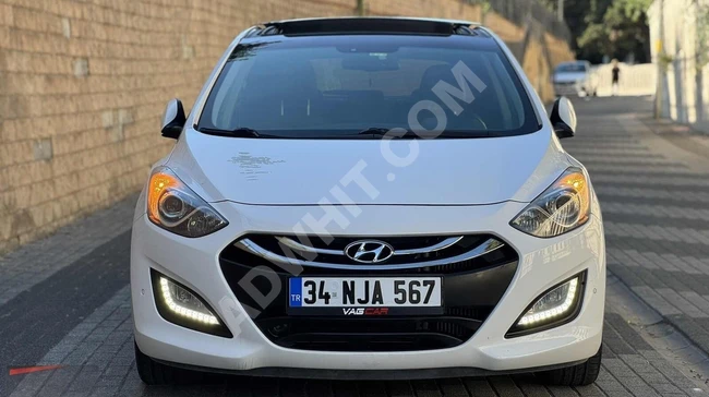 سيارة HYUNDAİ İ30 موديل 2014 - بدون حوادث -سقف بانورامي -زر تشغيل بدون مفتاح -نظام أوضاع القيادة -جير G -عرض خاص