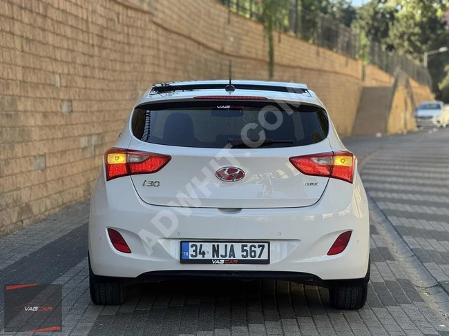 سيارة HYUNDAİ İ30 موديل 2014 - بدون حوادث -سقف بانورامي -زر تشغيل بدون مفتاح -نظام أوضاع القيادة -جير G -عرض خاص