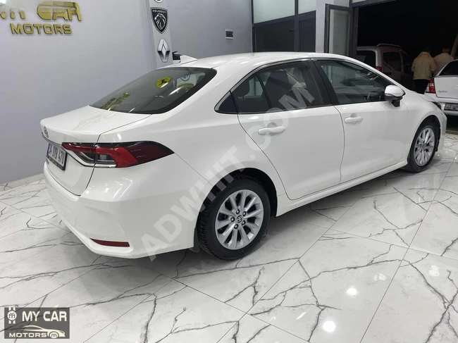 MY CAR MOTORS'TAN COROLLA