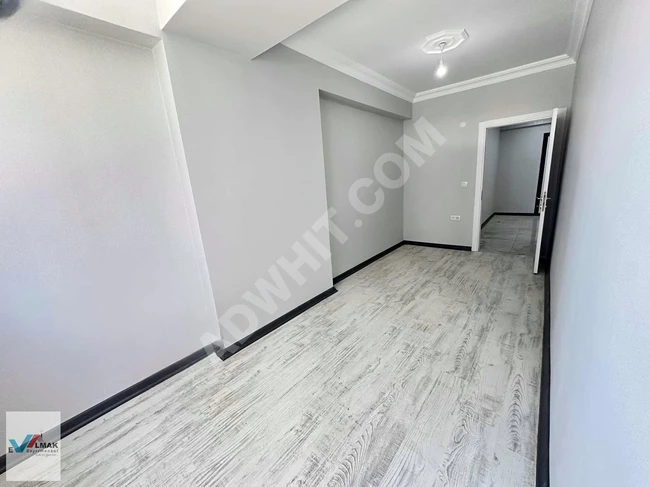 2+1 apartment (90 square meters) spacious and bright with an elevator and parking in HALKALI