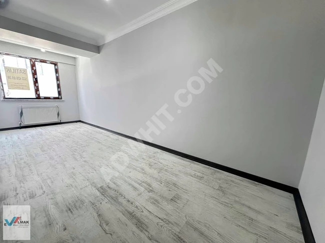 2+1 apartment (90 square meters) spacious and bright with an elevator and parking in HALKALI