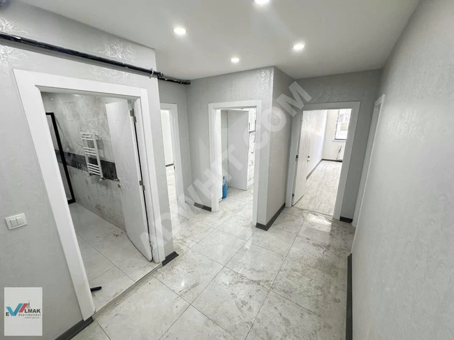 2+1 apartment (90 square meters) spacious and bright with an elevator and parking in HALKALI