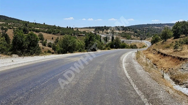 A suitable plot of land with an area of 6,466 square meters on the main frontage of KÜTAHYA TAVŞANLI road.