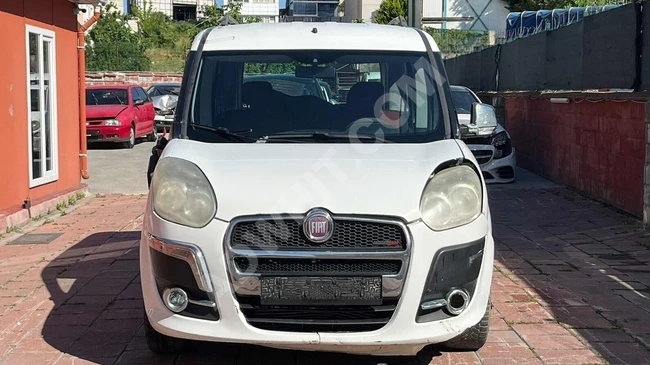 Damaged minivan DOBLO COMBI 1.3 M JET SAFELINE model 2014 from YARIS