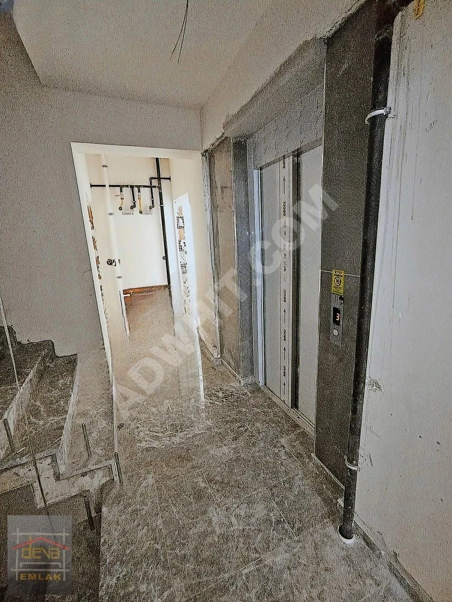 فرصة شقة 2+1 الطابق الأول بالقرب من BAĞLARBAŞI بمبنى جديد