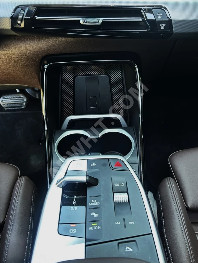 سيارة İX1 eDrive20 X-Line / بمسافة 8,000 كم/ فرش جلدي باللون الموكا
