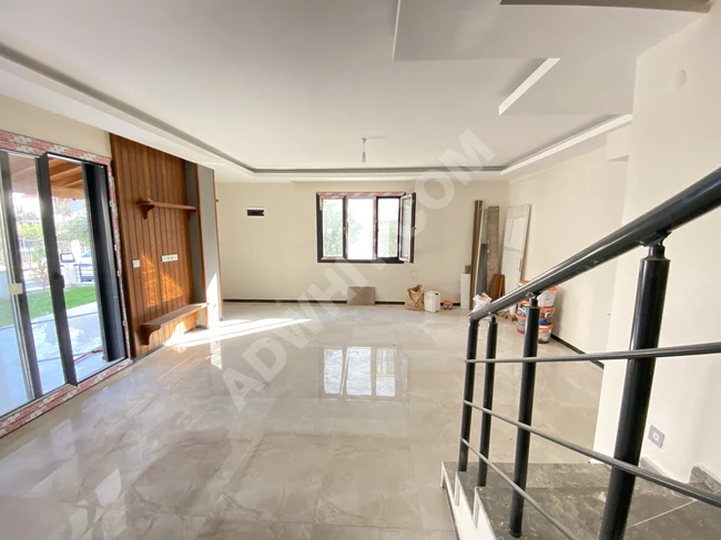 Villa for sale 3+1 with garden and close to the sea in Seferihisar Doğanbey
