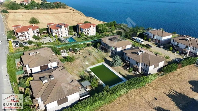 KUYULU EMLAKTAN FALEZİA KONAKLARINDA 5+2 SATILIK LÜKS VİLLA