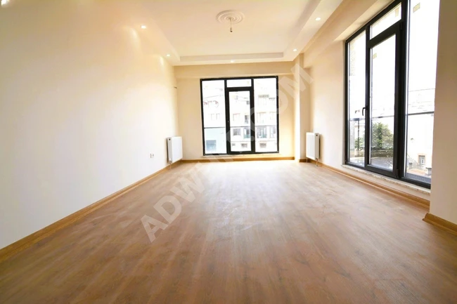 An apartment in the BUTİK complex, completely new, with a parking space, elevator, and on a middle floor.