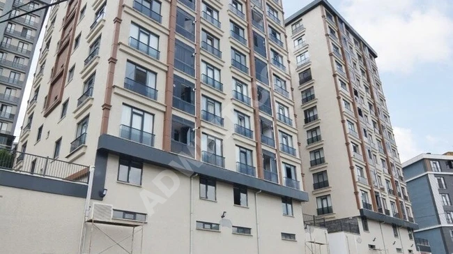 An apartment in the BUTİK complex, completely new, with a parking space, elevator, and on a middle floor.