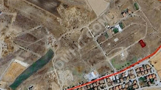 Independent land with an area of 400 square meters and a construction permit for sale in BÜYÜKKARIŞTIRAN YIRDIRIM