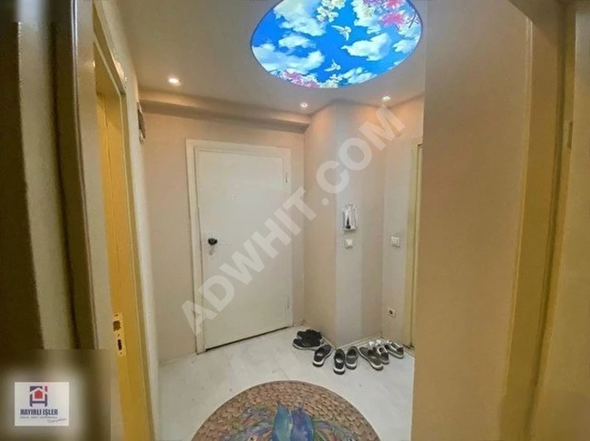 2+1 apartment for sale with parking, parallel to the main street.