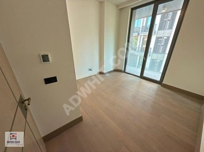 Large 1+1 apartment for sale in DAP YAPI NİŞANTAŞI KORU with balcony - corner apartment