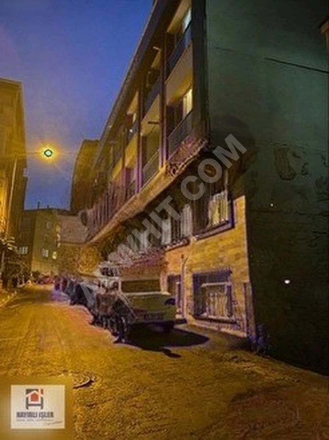 2+1 apartment for sale with parking, parallel to the main street.