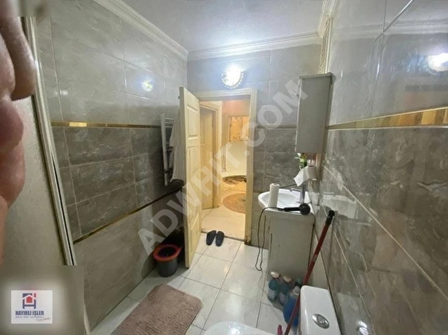 2+1 apartment for sale with parking, parallel to the main street.