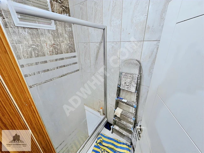 3+1 apartment, ÇIRÇIR metro 250 meters away, building with a bathtub and inhabited, first floor, with an area of 115 square meters.