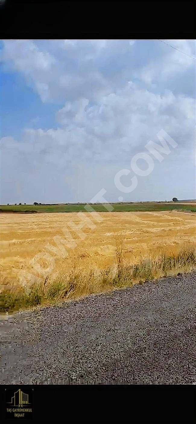 Land for sale with a frontage on the main street near the SARAY İLÇE center, with an area of 3402 square meters. Possibility of exchange with a car.