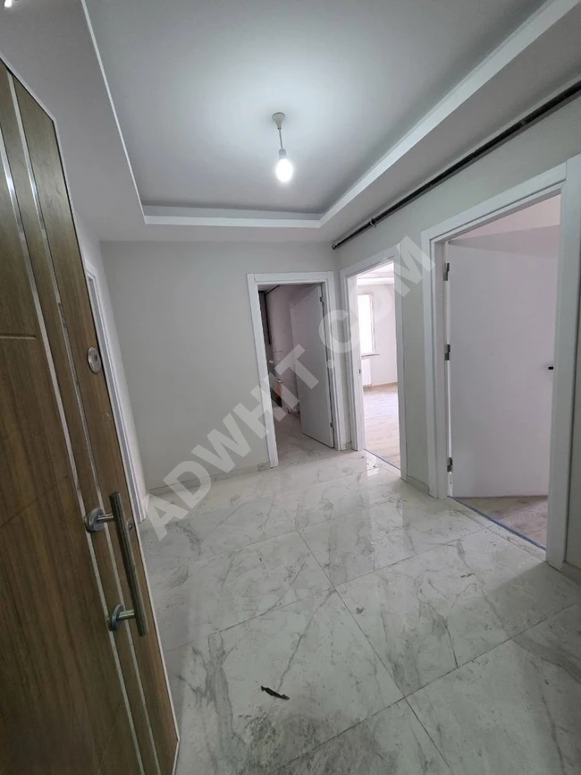شقة 2+1 ببناية جديدة مع موقف سيارات، واجهة أمامية، في AVCILAR حي MERKEZ