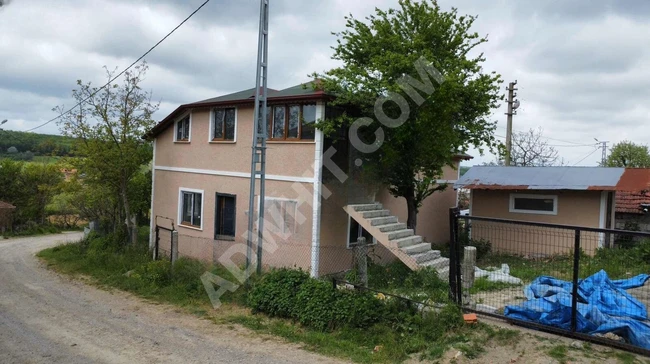 ارض للبيع مع بيت مستقل بحديقة في SAKARYA KAYNARCA KARAÇALI
