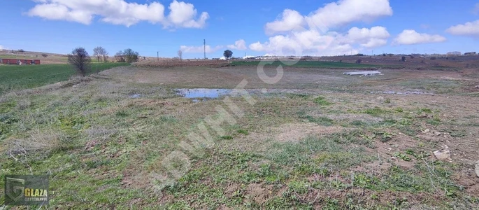 فرصة أرض بمساحة 3957 متر مربع على جانب الطريق الأسفلت