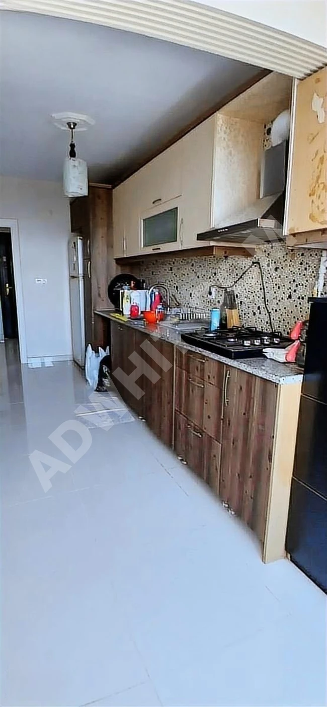 2+1 apartment for sale with full view of the lake and sea, completely renovated, in Avcılar Gümüşpala.