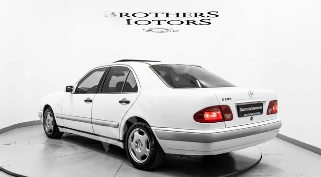 BROTHERS MOTORS KUSURSUZ KONDİSYONDA WHİTE ANGEL E200