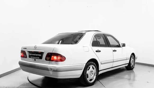 BROTHERS MOTORS KUSURSUZ KONDİSYONDA WHİTE ANGEL E200