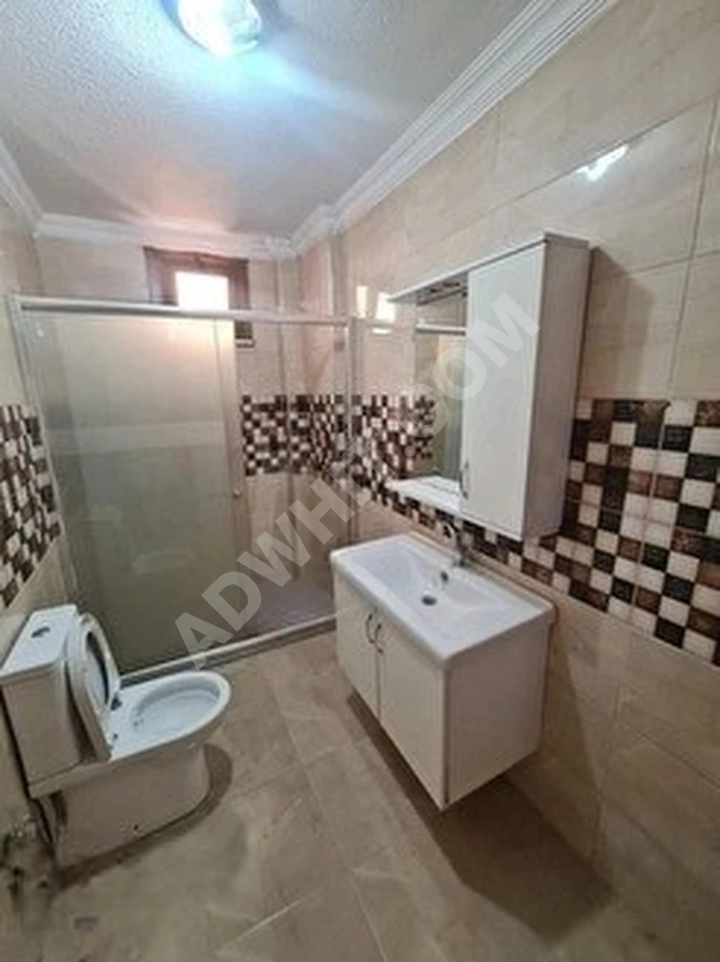 GENÇ BİNADA SATILIK KREDİYE UYGUN BALKONLU ASANSORLU 2+1 DAİRE