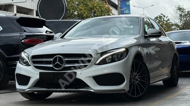 MERCEDES C 180 AMG 9G-TRONIC, model 2018 + dual memory - with 14,000 km mileage - no faults.