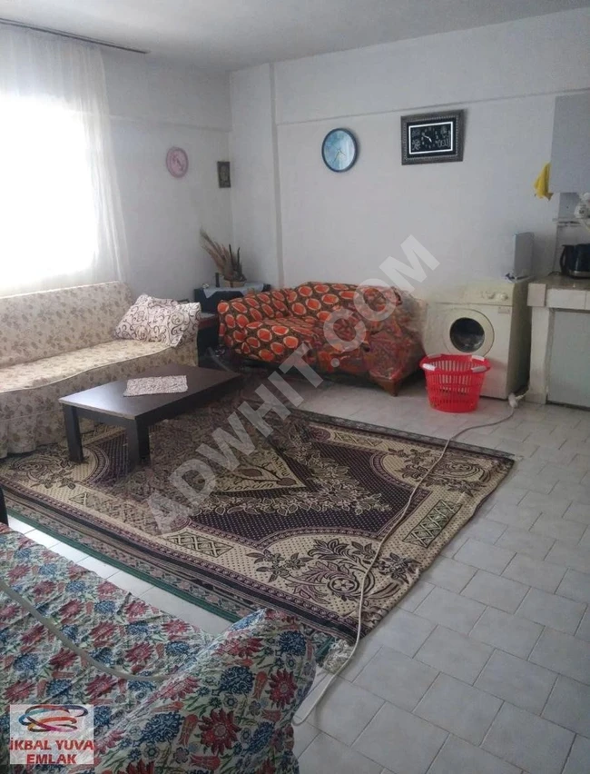 1+1 apartment with a sea view and private beach for sale inside the complex.