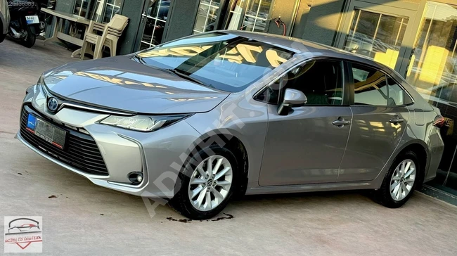 سيارة COROLLA HYBRİD موديل 2021 بدون حوادث بمسافة 55 ألف كم، مضمونة