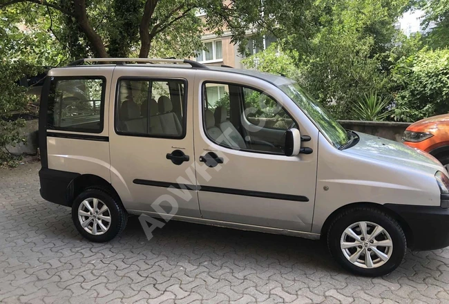 ميني فان DOBLO COMBİ  1.9 JTD TURBO ببابين جانبيين منزلقين، مكيف, بقوة 105 حصان