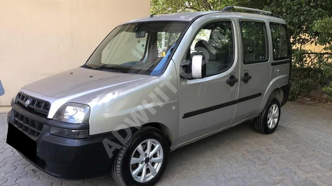 ميني فان DOBLO COMBİ  1.9 JTD TURBO ببابين جانبيين منزلقين، مكيف, بقوة 105 حصان