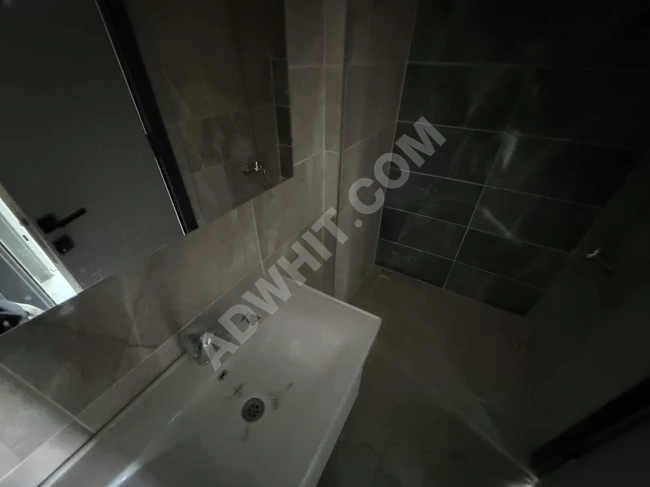 New 4+1 apartment for sale opposite the metro, next to İFM, with double balconies.