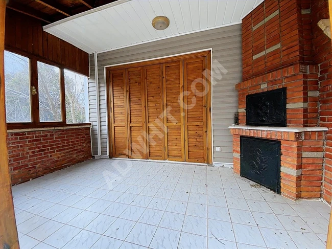 YENİÇİFTLİKTE BAHÇEDEN DENİZE AÇILAN KAPI BUTİK SİTE 5+1 VİLLA