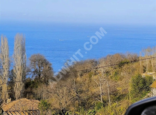 ارض بمنظر البحر والطبيعة الرائع