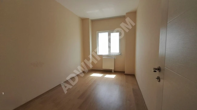 شقة للبيع الطابق الأوسط بجانب مركز KİPTAŞ التجاري