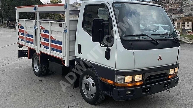 شاحنة MITSUBISHI 511 موديل 2006 بصندوق مفتوح