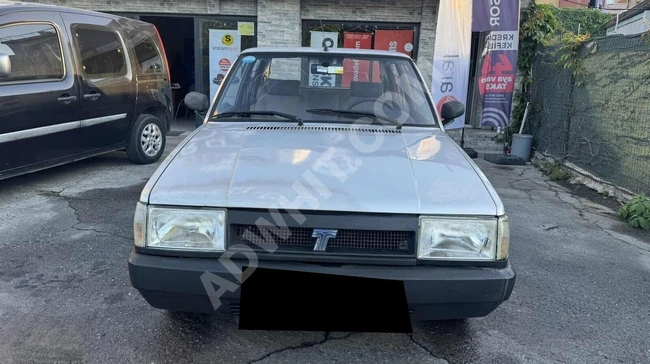 TOFAŞ ŞAHİN 65bin KM DE ORJİNAL DEĞİŞENSİZ TAKSİT İMKANI VARDIR.