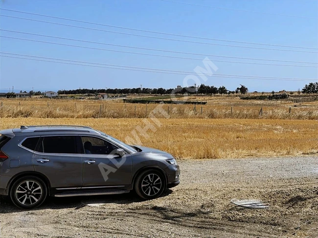 Land in a beautiful location, sea view, facing the road, single title deed in BALABAN.