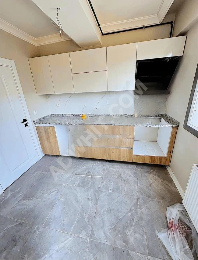 BAŞAKŞEHİR GÜVERCİNTEPE DE SATILIK ARA KAT 2+1 DAİRE