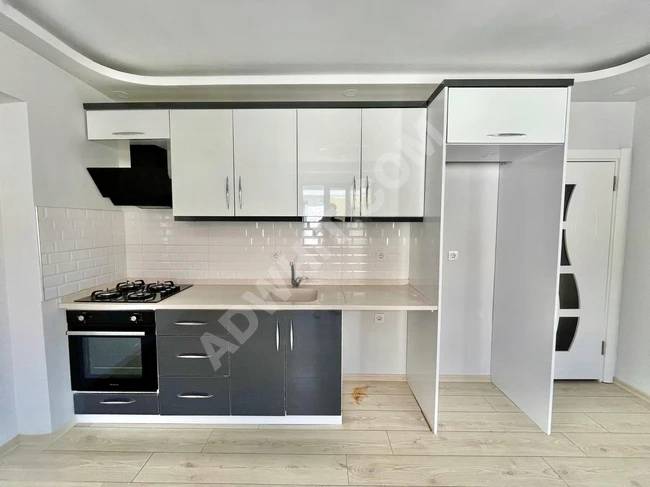 GÜMÜŞDEN DOĞALGAZLI ASASÖRLÜ LÜX TASARIM GENİŞ 1+1 DAİRE