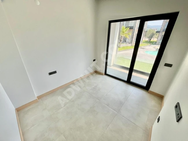 GÜMÜŞDEN 405M² ARSA İÇERİSİNDE TASARIMIYLA GÖZ DOLDURAN MÜSTAKİL