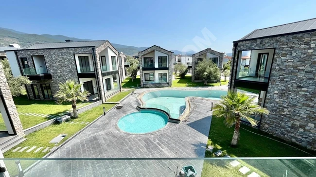 GÜMÜŞDEN 405M² ARSA İÇERİSİNDE TASARIMIYLA GÖZ DOLDURAN MÜSTAKİL