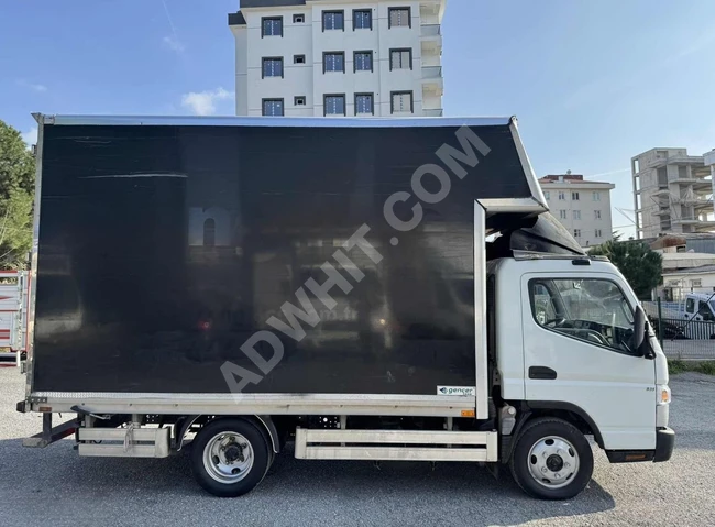 MITSUBISHI B35 truck, model 2016, with furniture box, has run 253,000 km.