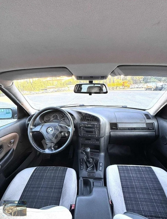 سيارة BMW 316i موديل 1997، بمسافة 250,000 كم، لا مثيل لها، قطعتان تم رشّهما بالطلاء.