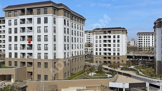 BAŞAKŞEHİR GÖÇMEN KONUTLARI ARSA PAYI YÜKSEK SATILIK DAİRE